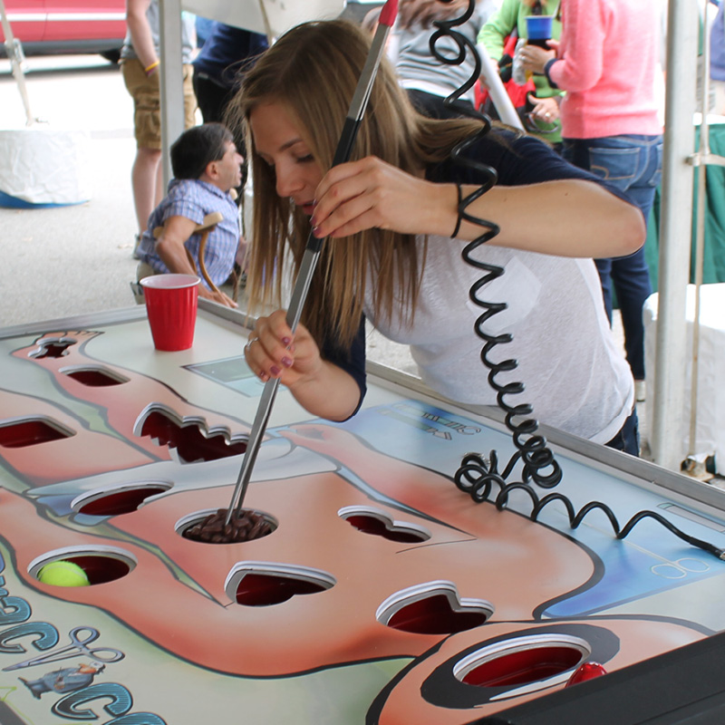 woman playing giant malpractice game